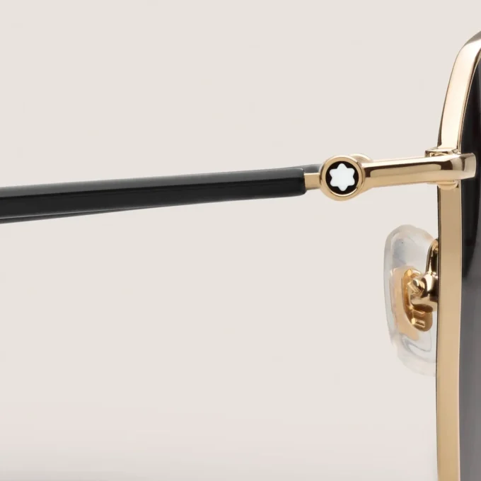 Lunettes de soleil carrées avec monture métallique dorée