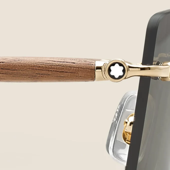 Lunettes de soleil carrées avec monture métallique dorée