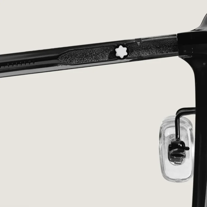 Lunettes de soleil ovales avec monture en acétate noir