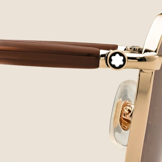 Lunettes de soleil rectangulaires avec monture métallique dorée