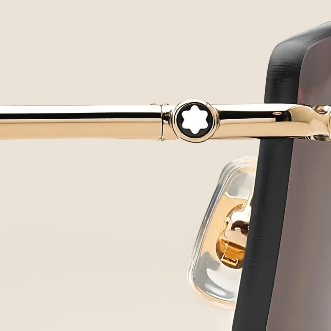 Lunettes de soleil rectangulaires avec monture métallique dorée