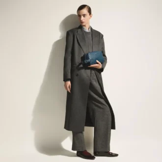 Pochette de toilette en cuir gaufré autruche